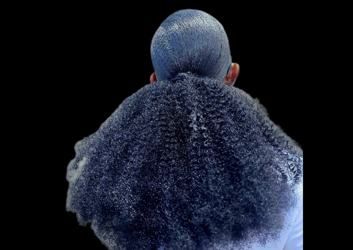 Sleek Afro ponytail.