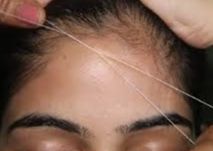 FOREHEAD THREADING