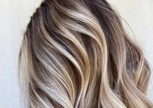 Root colour  touch up ,full highlights and blow dry .