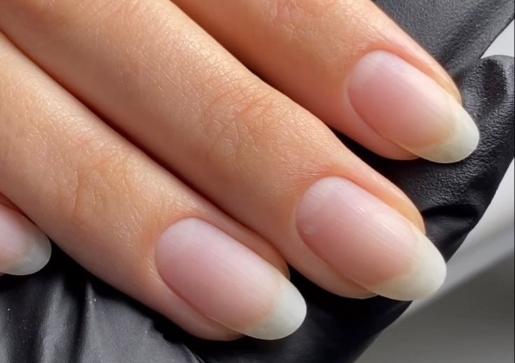 simple uncoated manicure (cuticle trim, nail shape and polishing)