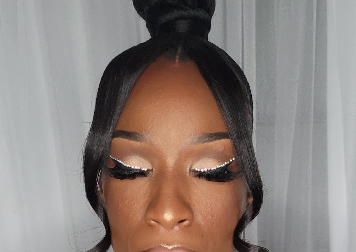 Ponytail/bun with extra details braids,bang etc 
