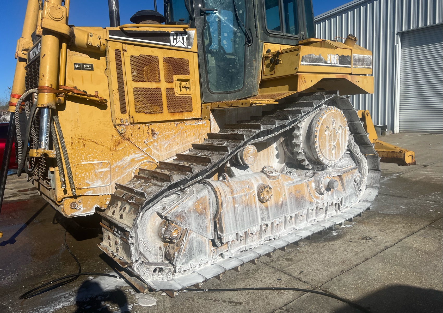 Bulldozer Pressure Wash/Mud Removal 