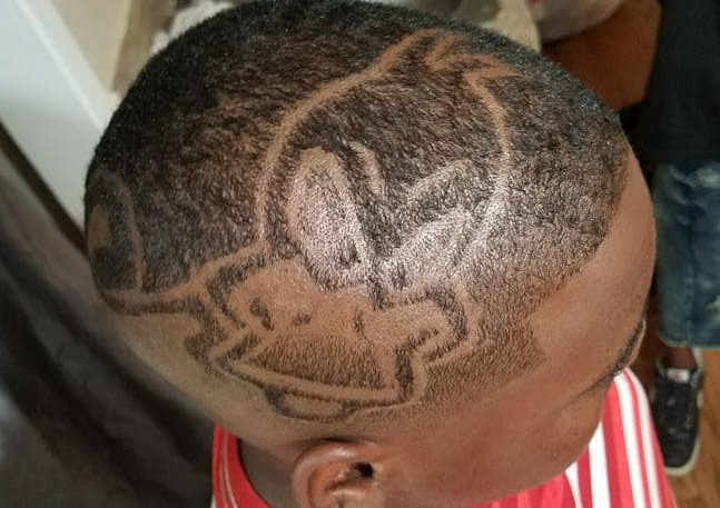 Bossed up Cartoon design haircut