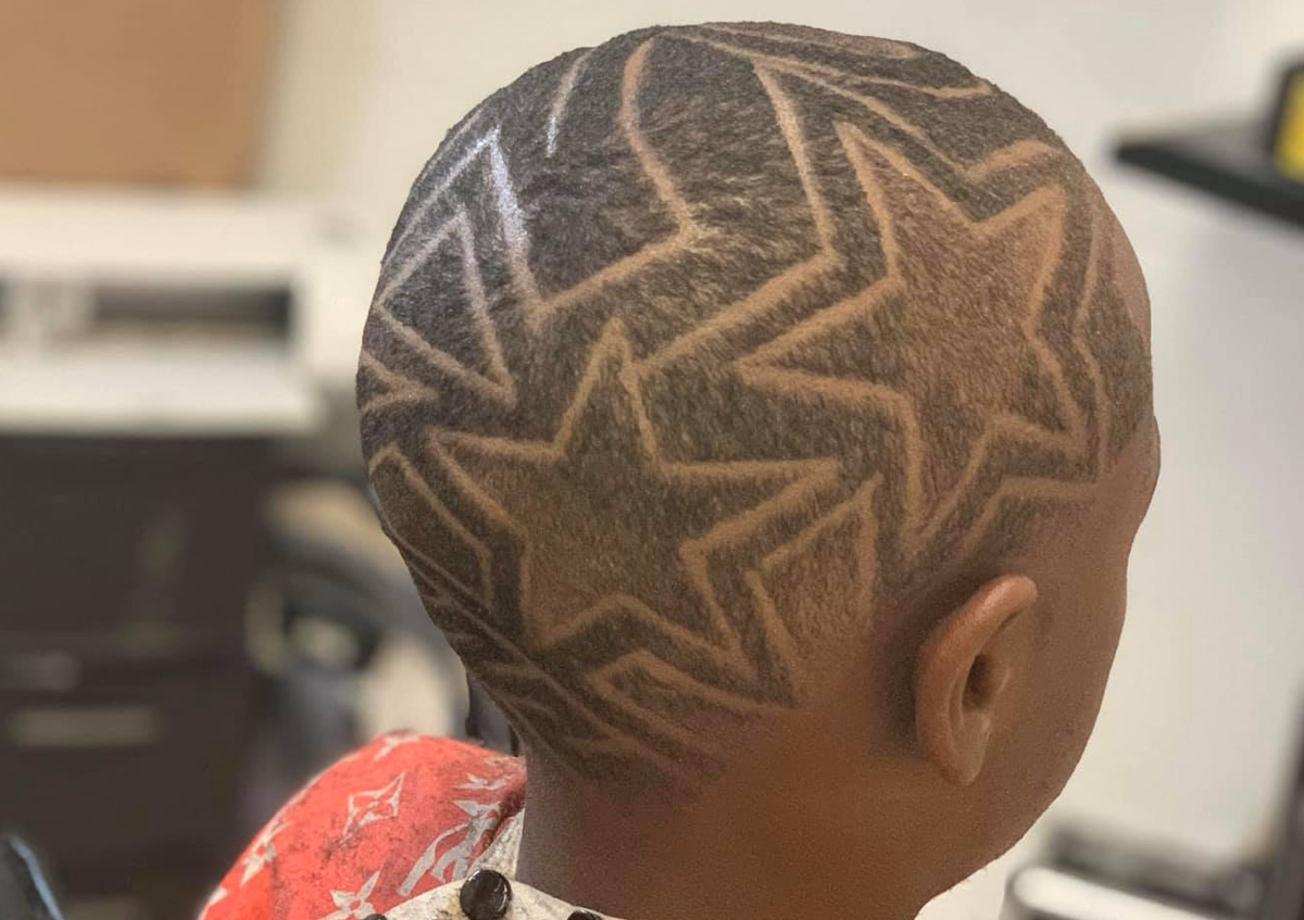 Bossed up kid low taper with design