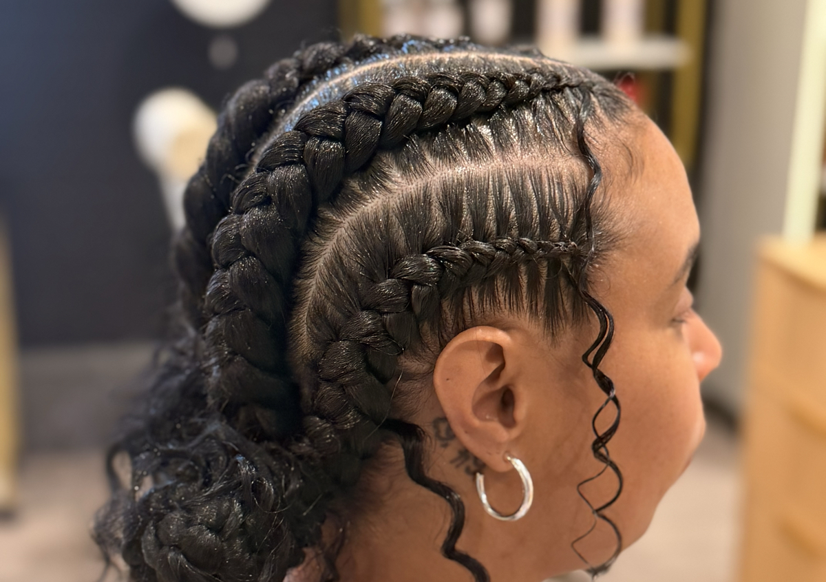 4 trenzas hacia atras con rizos 