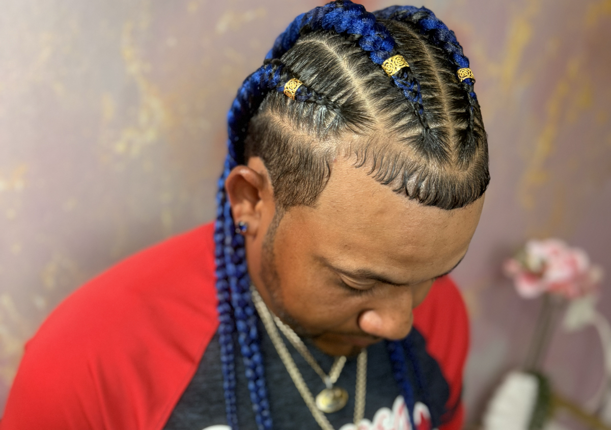 Cuatro trenzas hacia atrás con cabello añadido