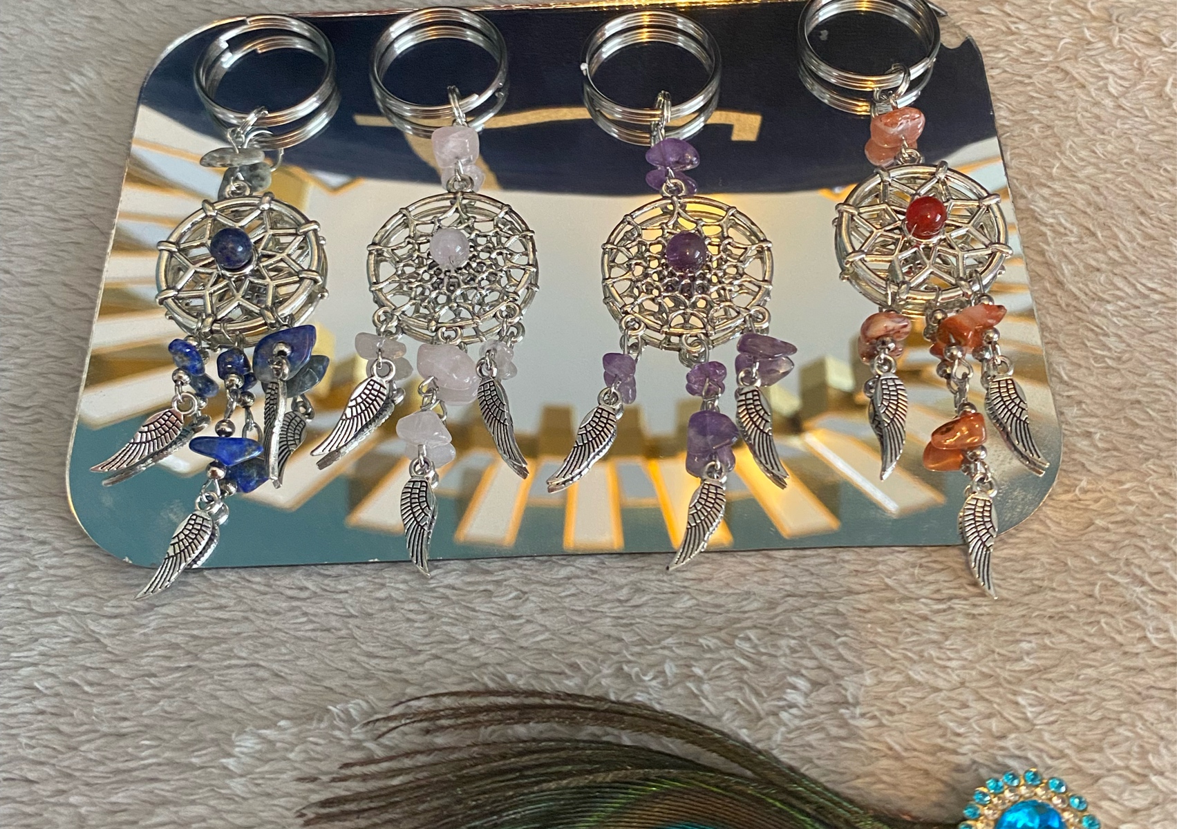 Dream capture key wings with gemstones