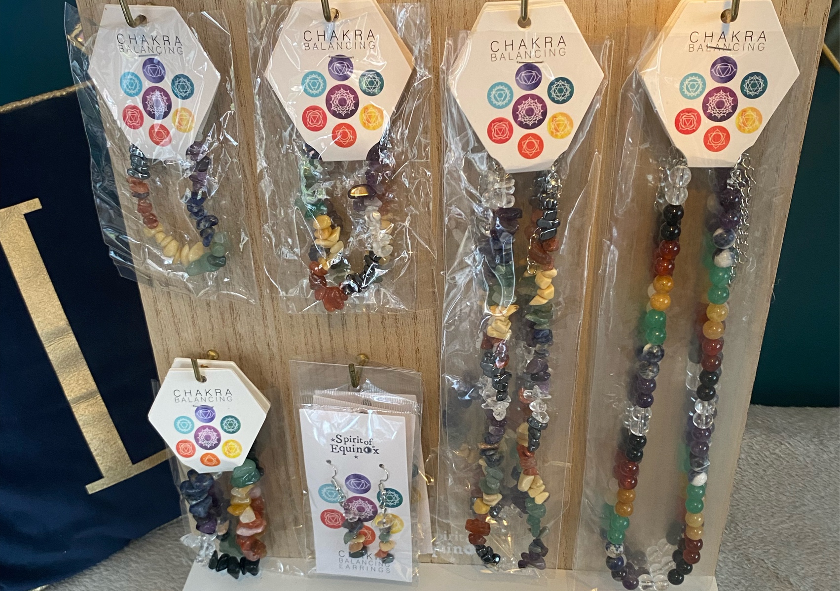 Selection of chakra healing jewellery.