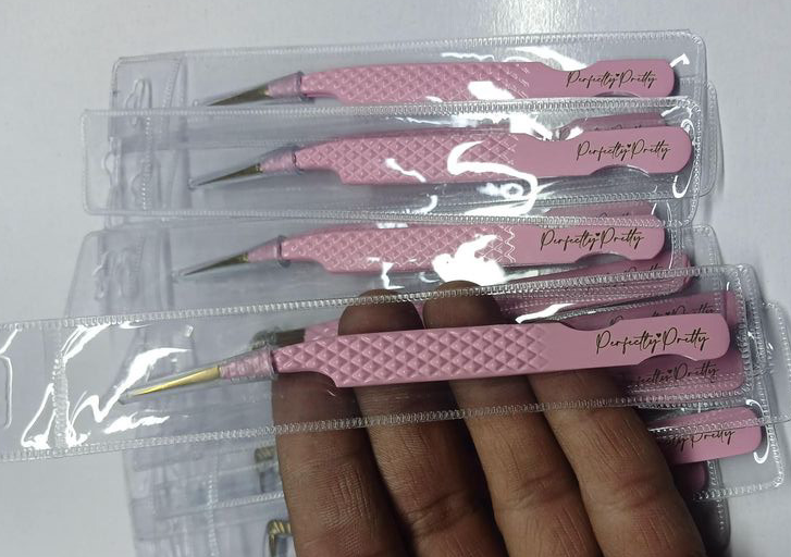 Curved isolation tweezer