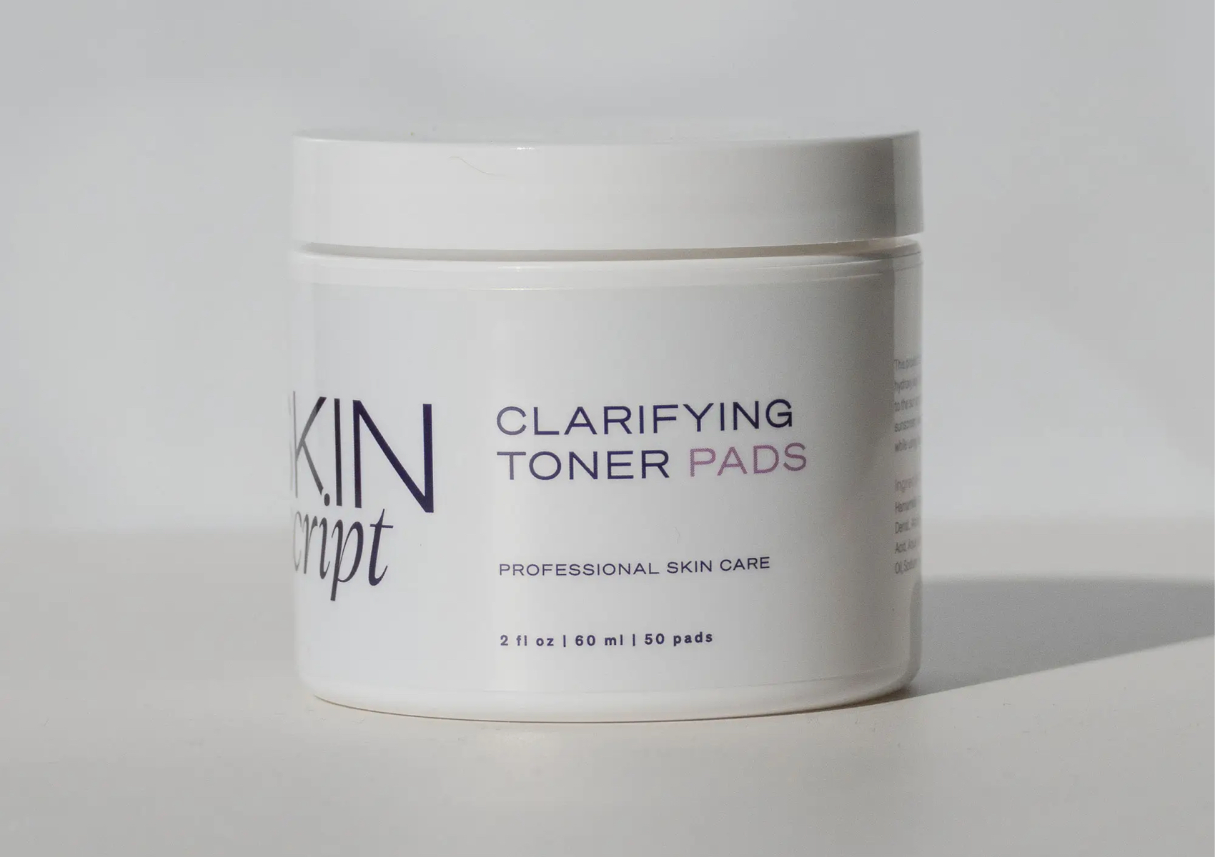 Clarifying toner pads