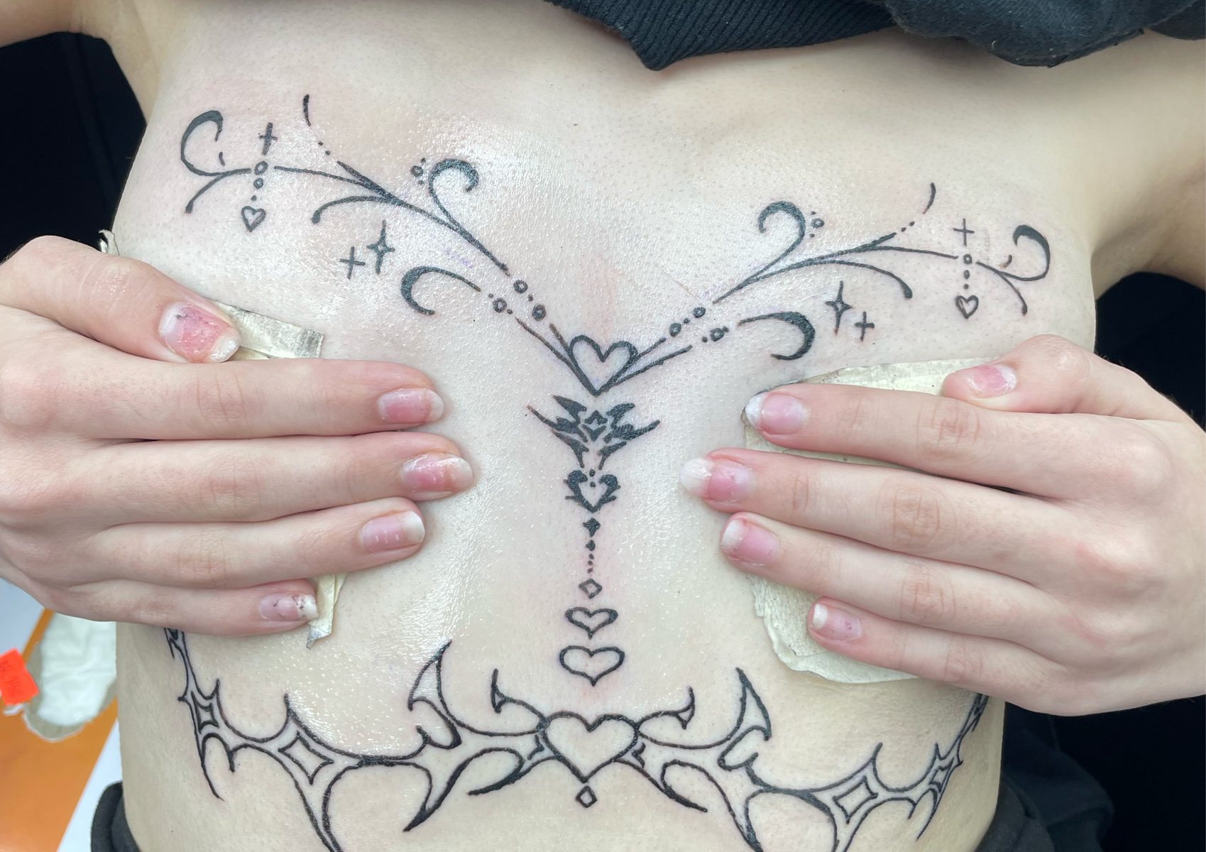 Half chest piece tattoo