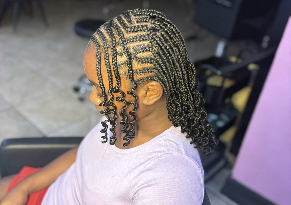 Feed in braids to front, knotless to the back