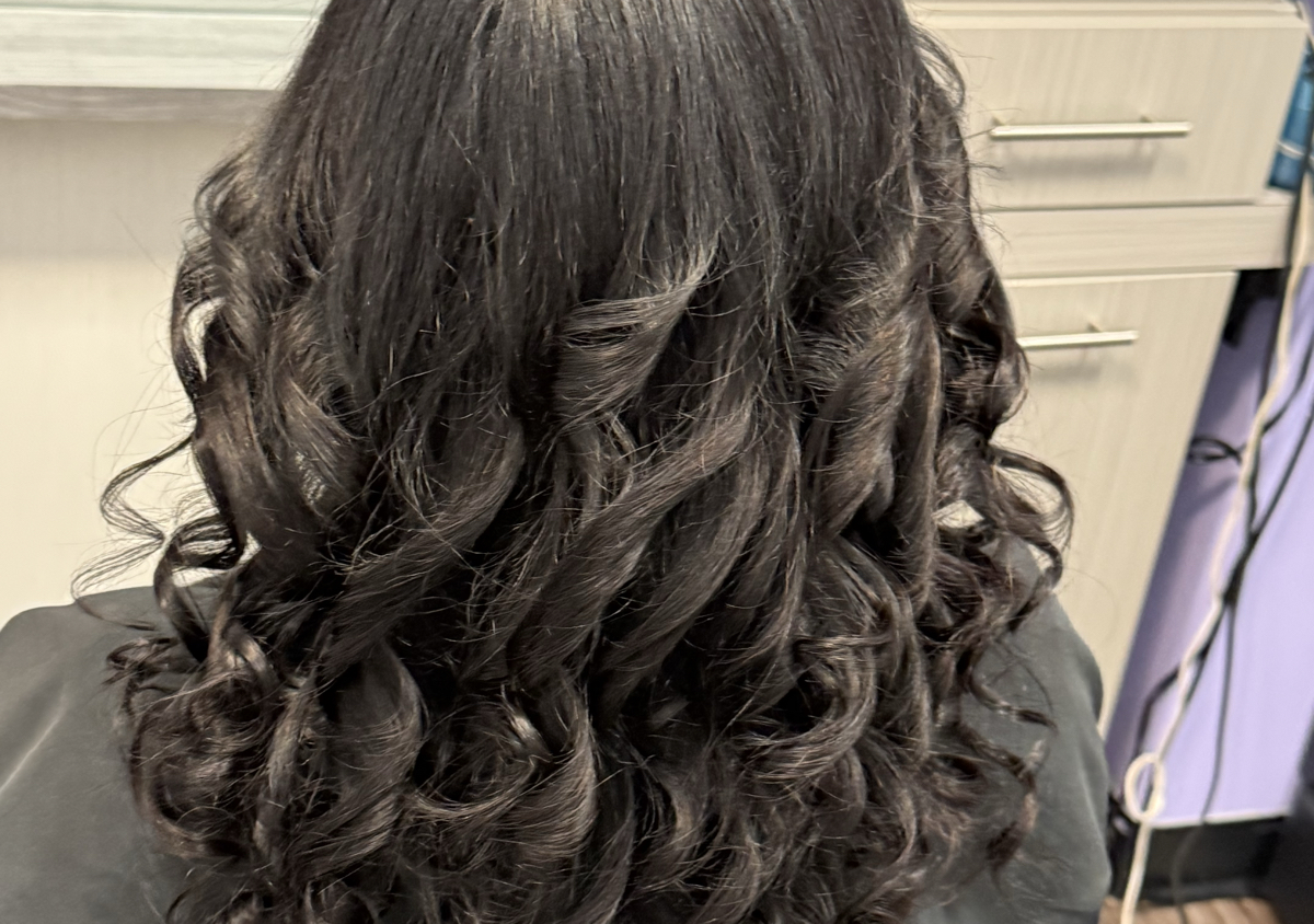 Includes a shampoo, , blowout, flat iron or curls