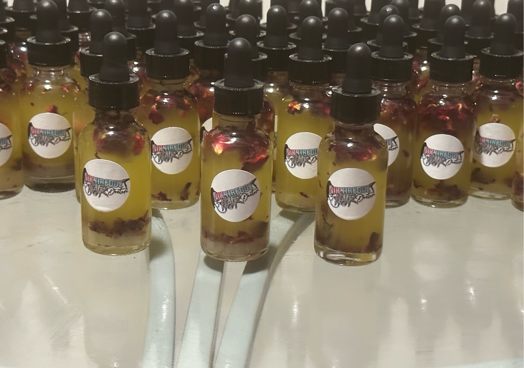 Nikkireddzstyles herbal hair growth oil