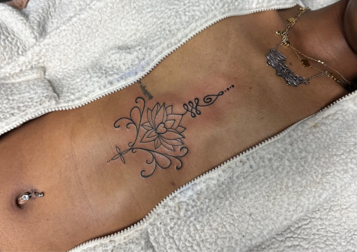 sternum or rib tattoo 
