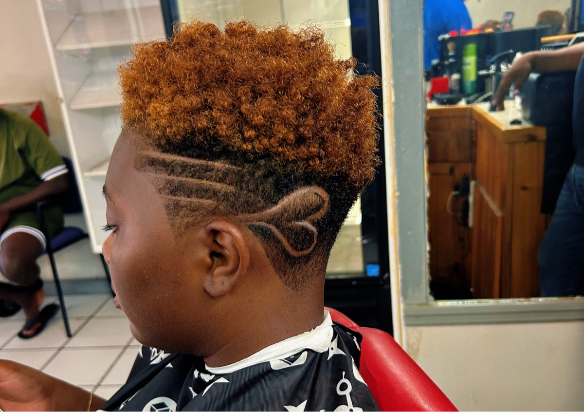 Woman haircut with designs 