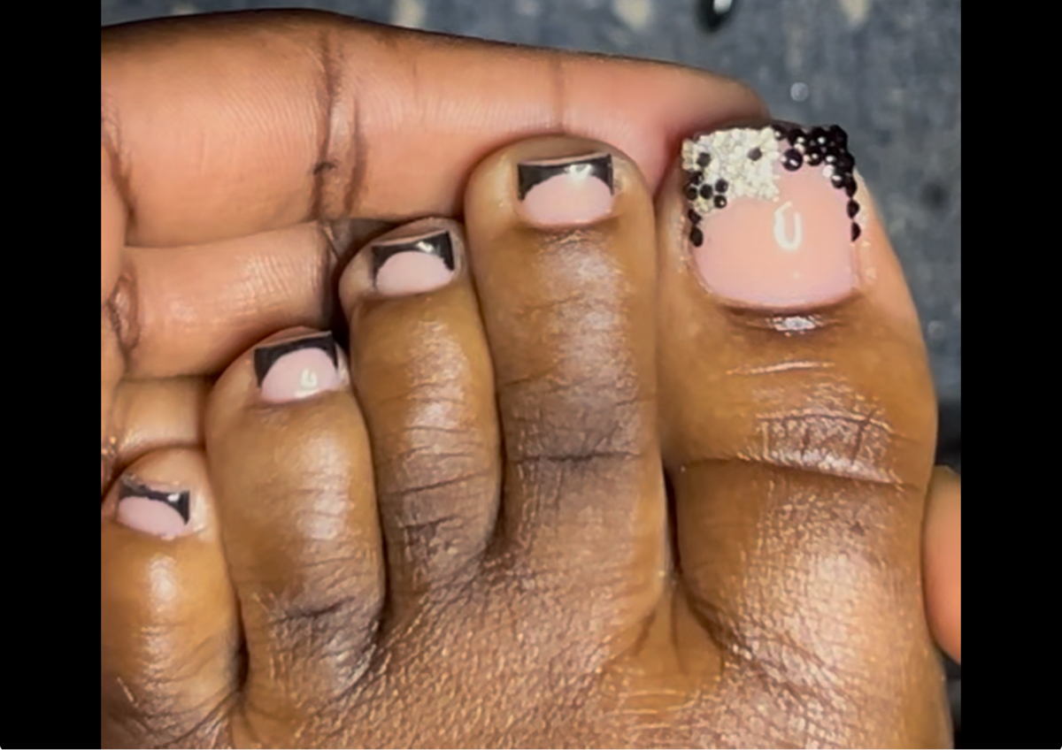 Acrylic on all with design on the big toe 