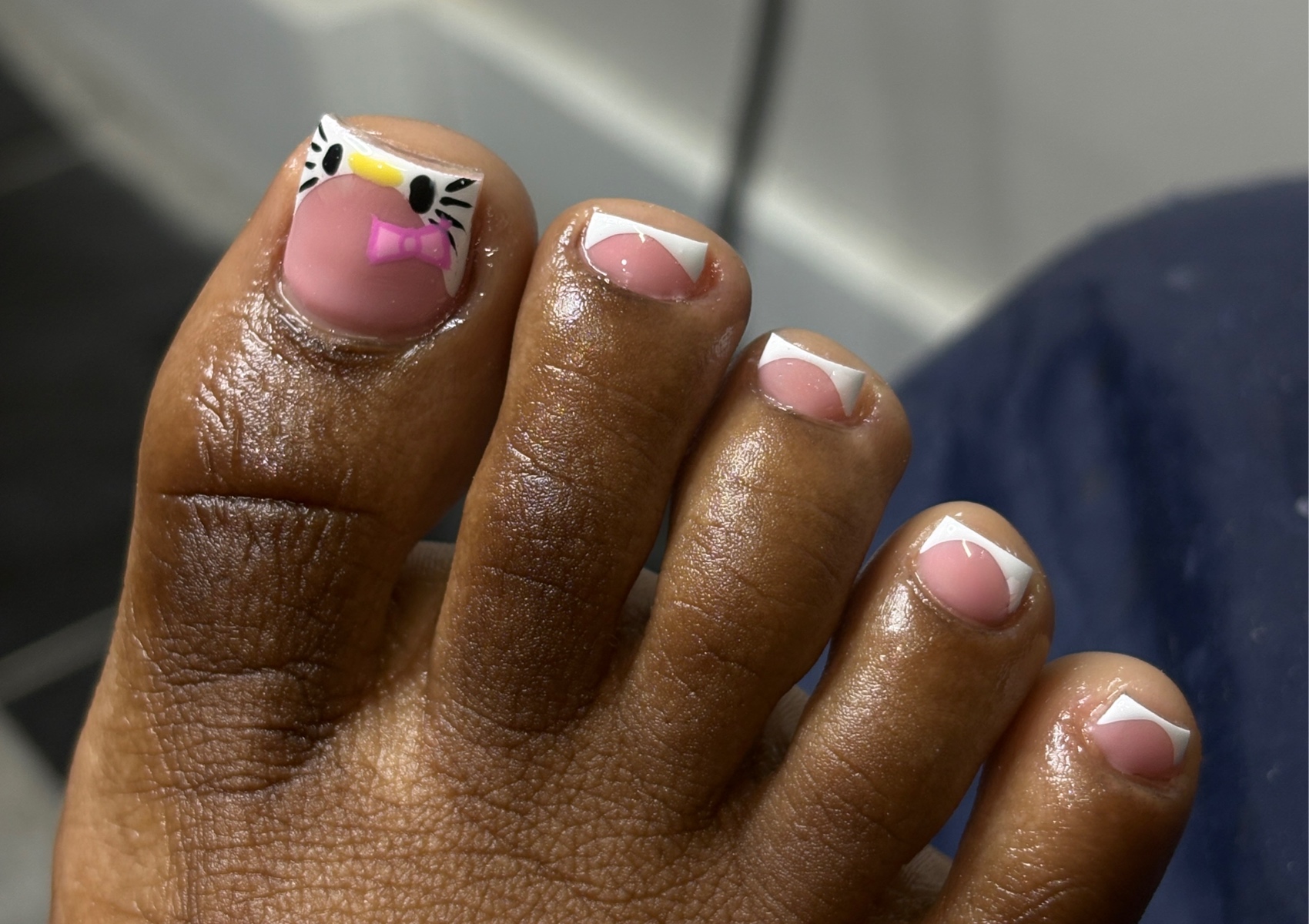 Basic french toes with design on the big toe 