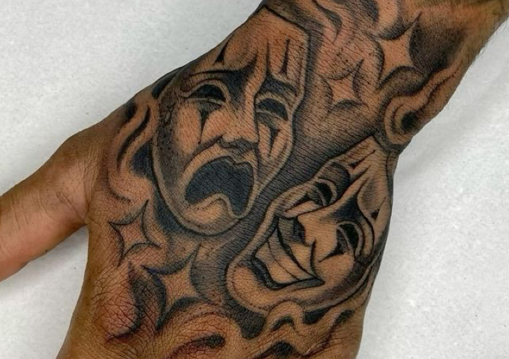 Hand tats