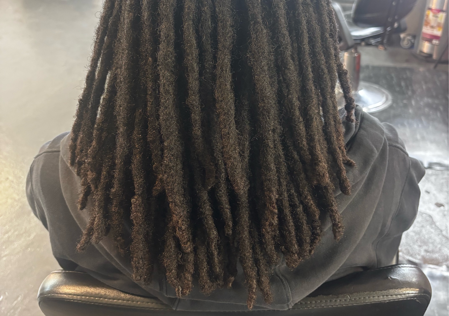 Loc  retwist (mid back long locs)
