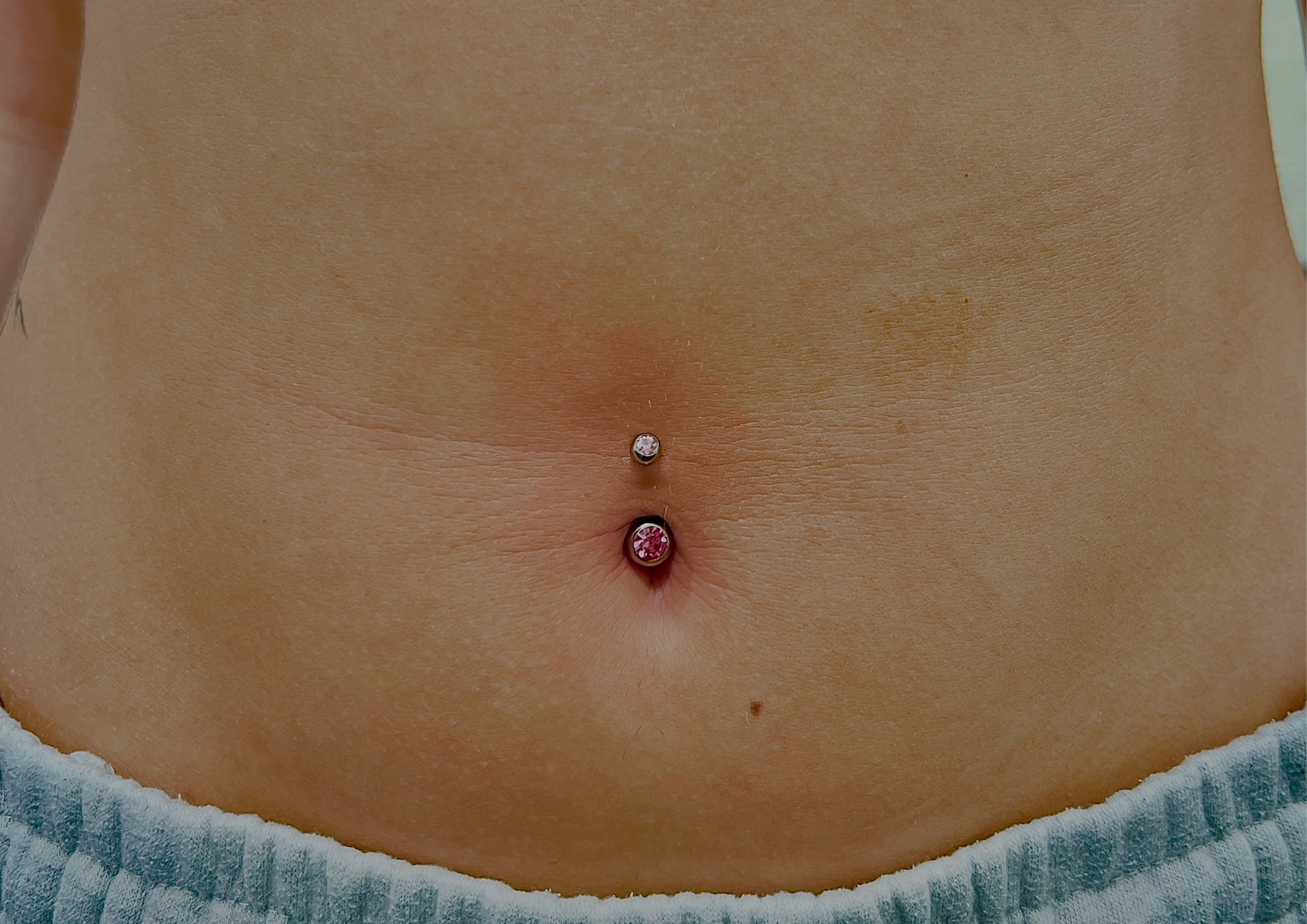 Navel piercing (belly)
