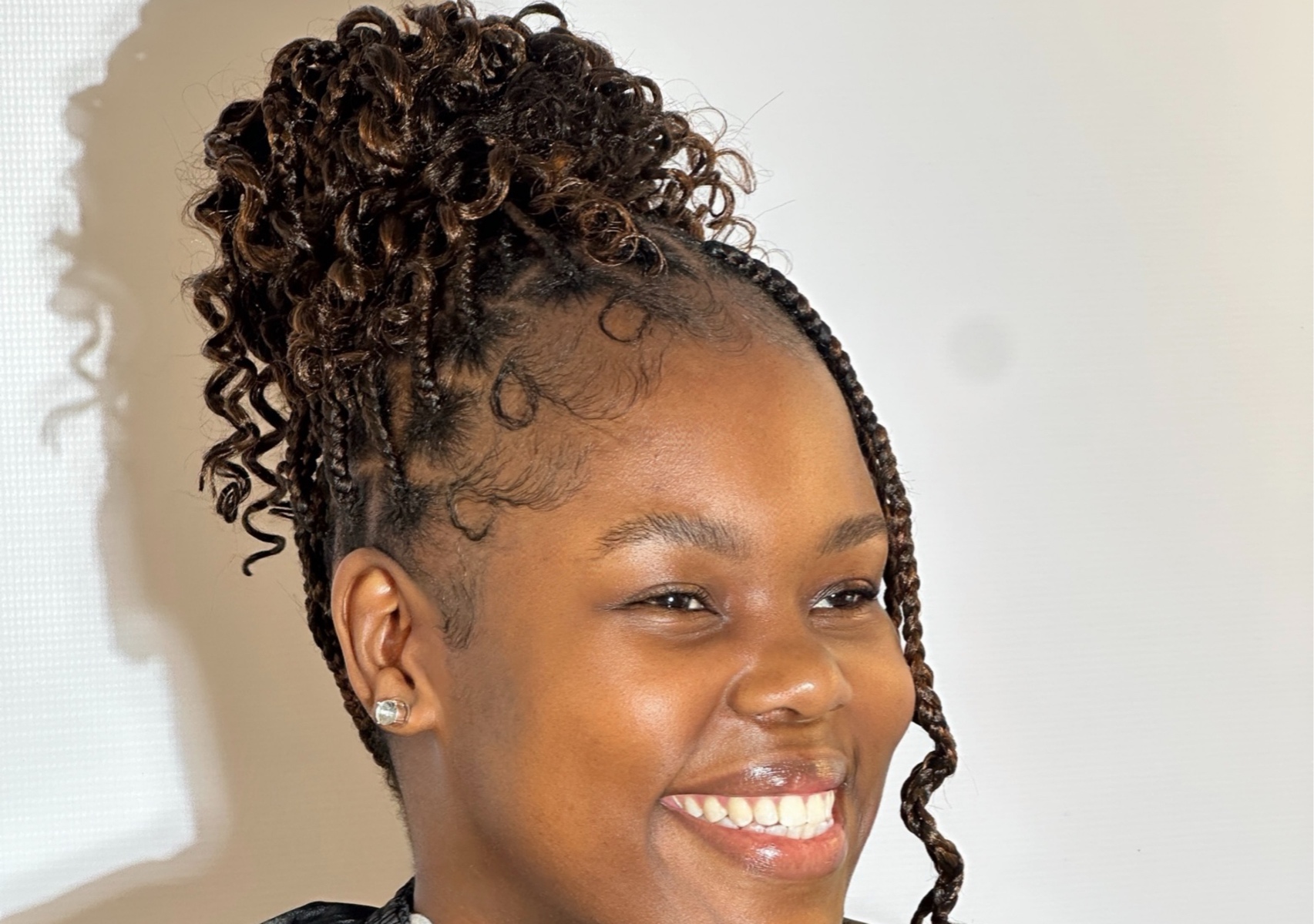 Short braids with curls 