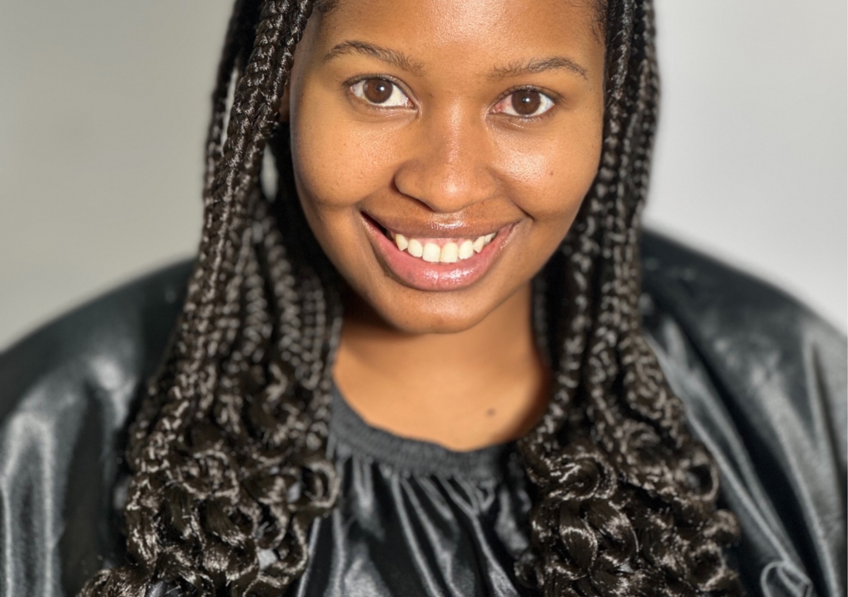 Short knot less braids with curls at the bottom 