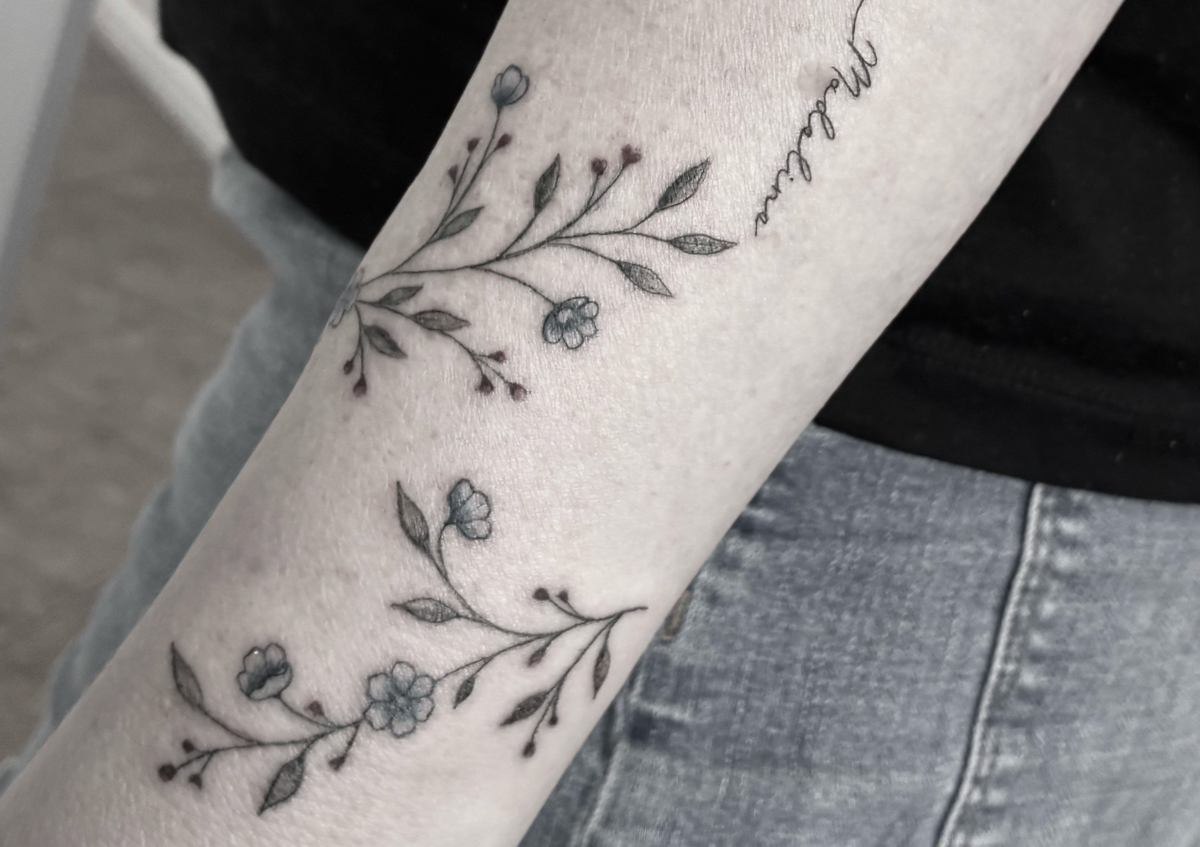 Half Arm Wrap Tattoo