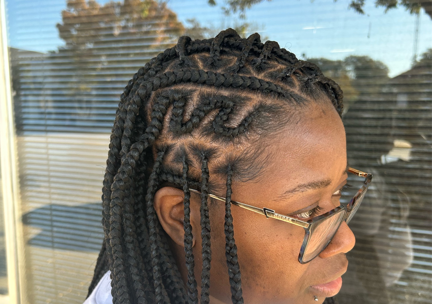 Medium knotless half design flip over braids