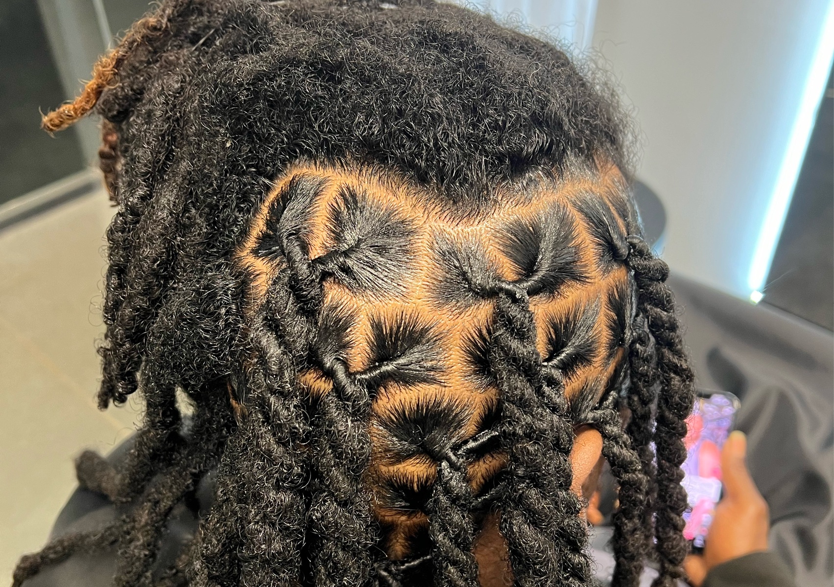 Dreadlocks retwist