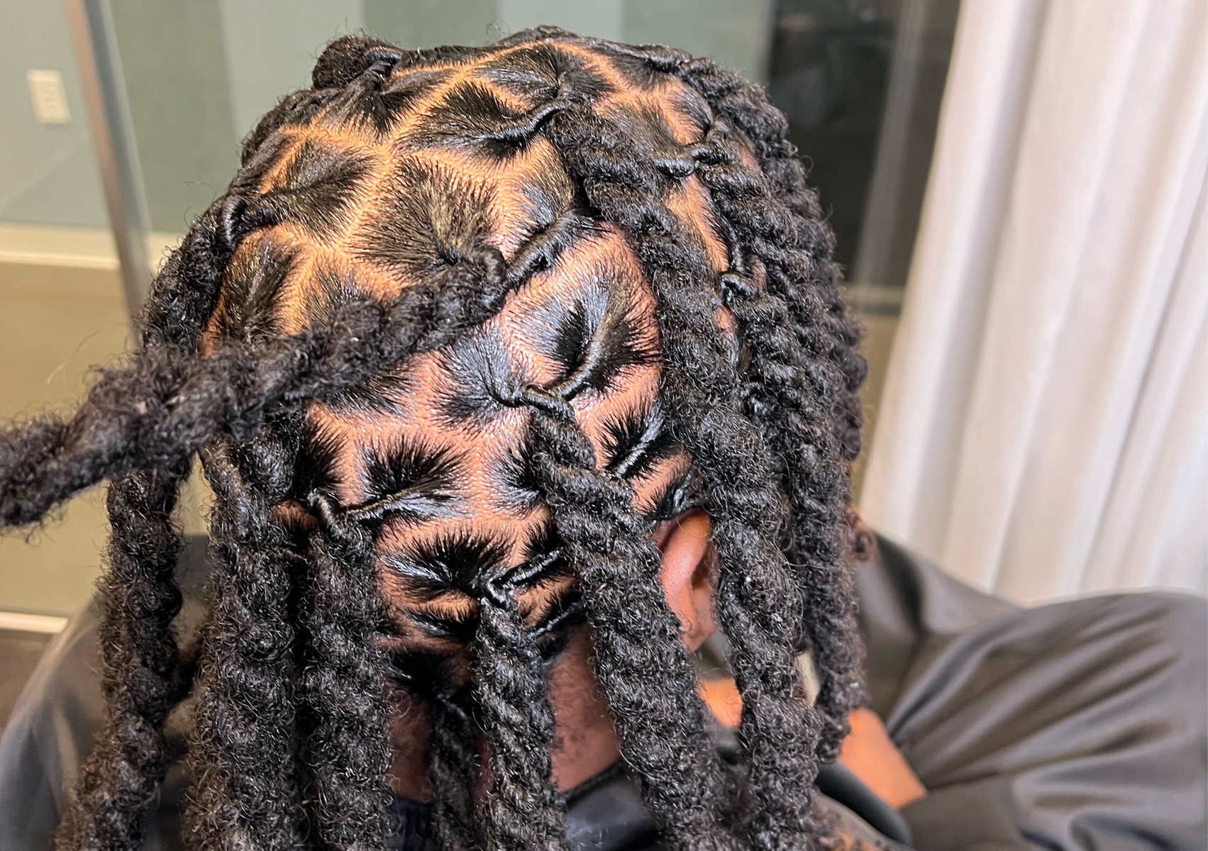 Dreadlocks retwist and style 