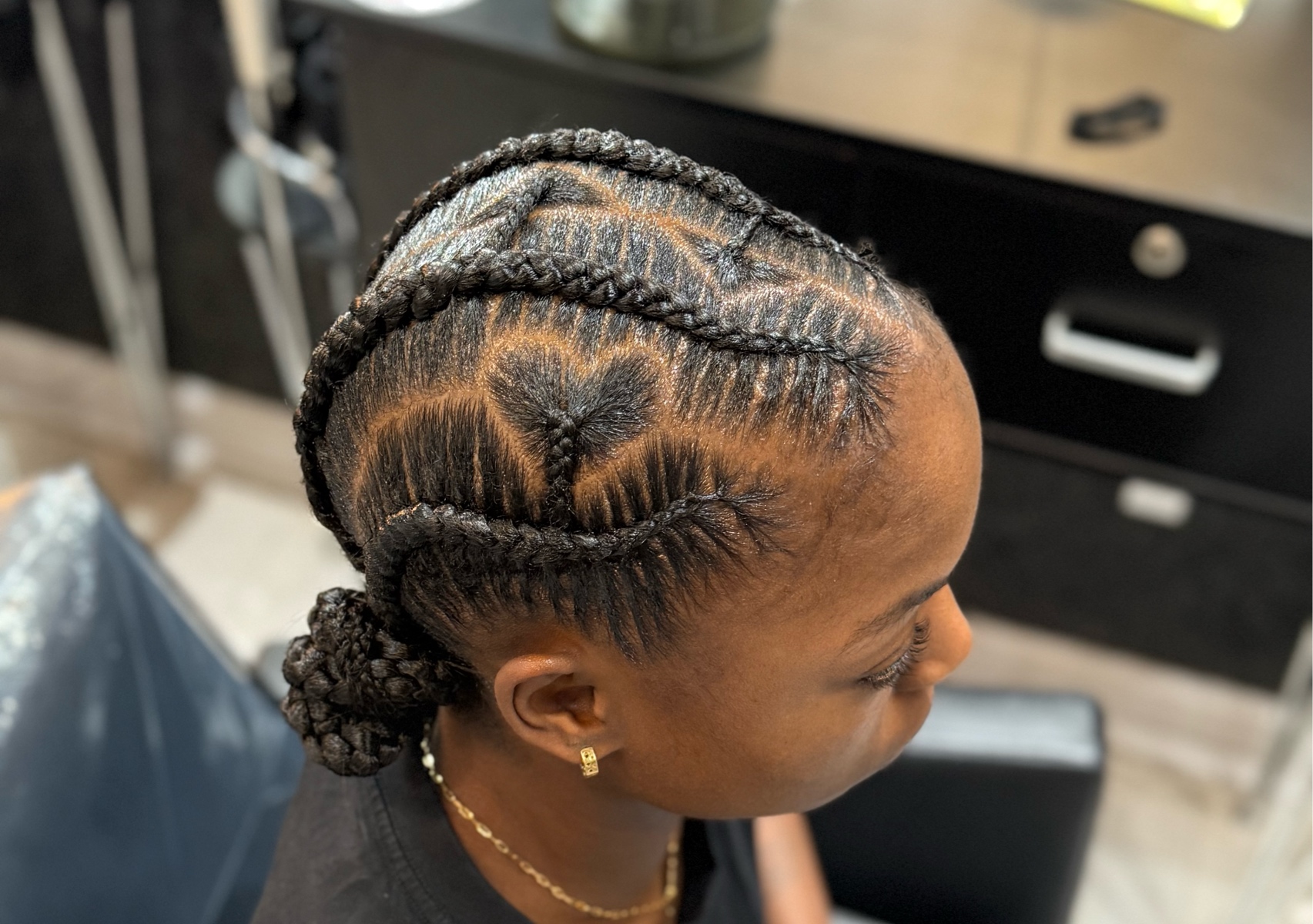 Canerow: 2-4 stitch Feed in braids (hair & wash included)