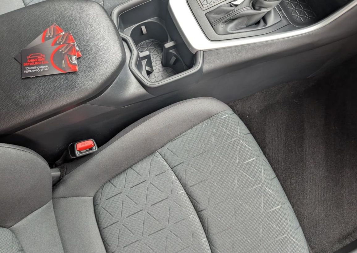 Base interior/exterior detail of sedan/compact suv