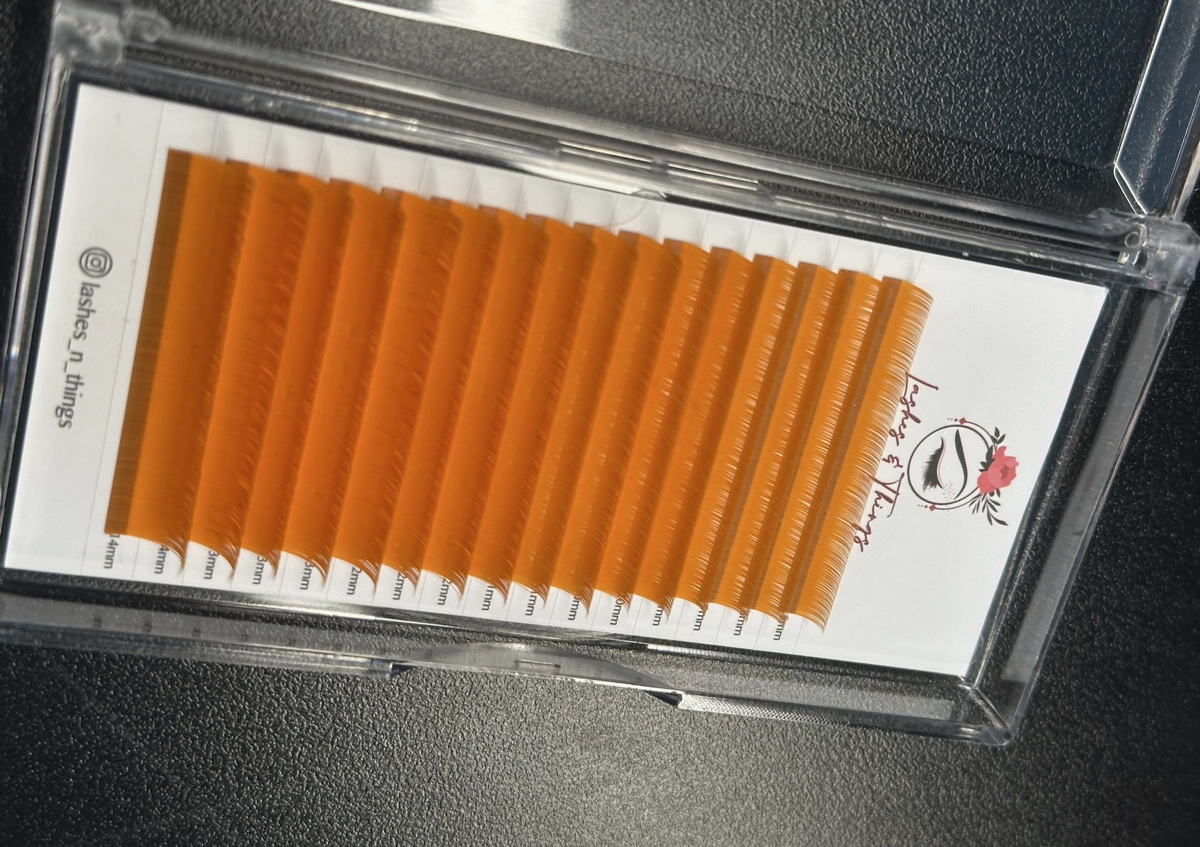 Neon orange volume lash extensions