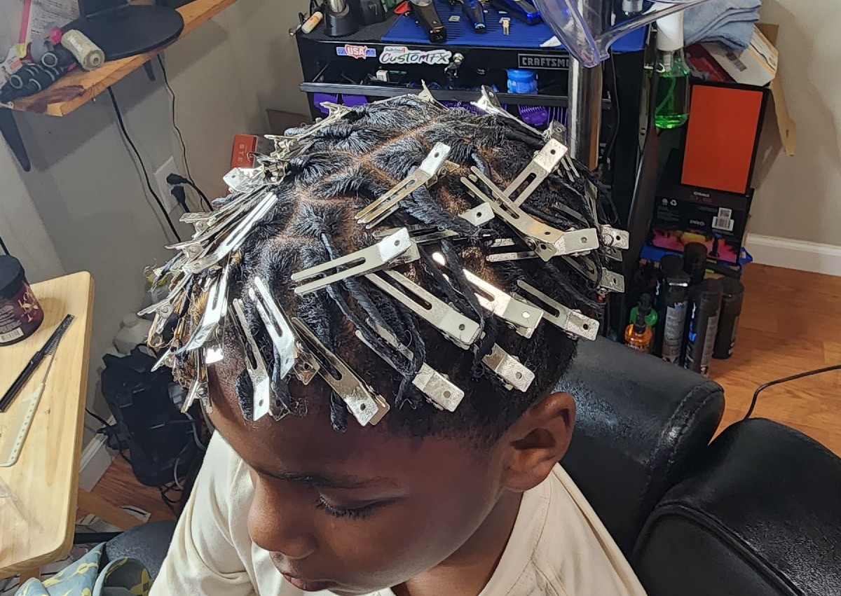 Starter locs half of head  (come washed and blow dried) Pricing may vary depending on size and amount