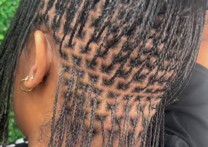 Natural hair Microlocs installation with braid method